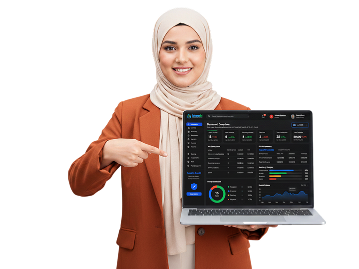 Consultant presenting the Faturathi dashboard on a laptop